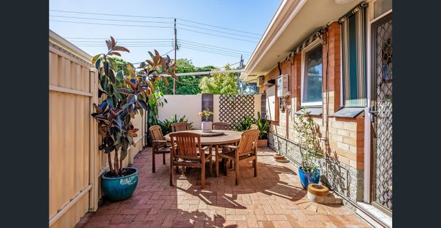 Pristine 2-Bedroom Unit in Ideal Location! - Photo 1