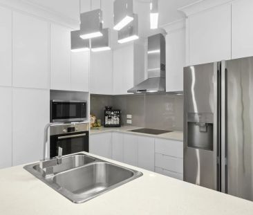 Stylish Townhouse with Exceptional Outdoor Living - Photo 1