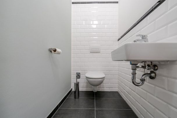 Barrierefreie Gartenwohnung mit Terrasse und Tiefgaragenparkplatz - Photo 1