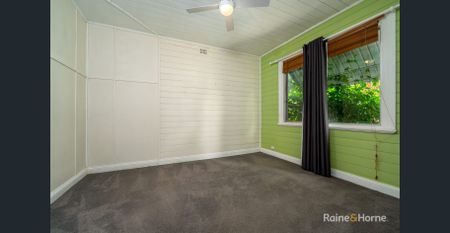 Well-Appointed Home with a Large Flat Backyard in a Central Location - Photo 2