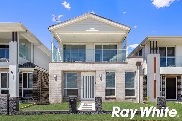 BRAND NEW AND READY FOR YOU Four Bedroom Residence Walking Distance to Nirimba Fields Public School! - Photo 1