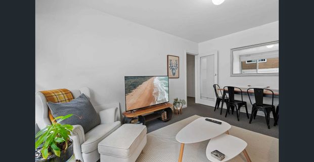 Fully Furnished & Renovated Courtyard Bliss - Photo 1