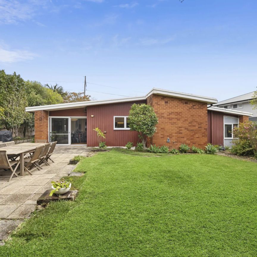 Mid-Century Charm Meets Modern Family Living - Photo 1