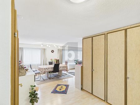 GENEROUS IN FAMILY-FRIENDLY NEIGHBORHOOD - Photo 3