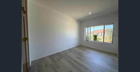 Stylish Fully Renovated Family Home with Rumpus Room! - Photo 3