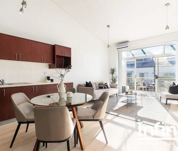 LOFT STYLE, SPLIT LEVEL TWO-BEDROOM APARTMENT AVAILABLE FOR RENT! - Photo 2