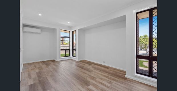 STYLISH LOW MAINTENANCE FAMILY HOME WITH POOL! - Photo 1