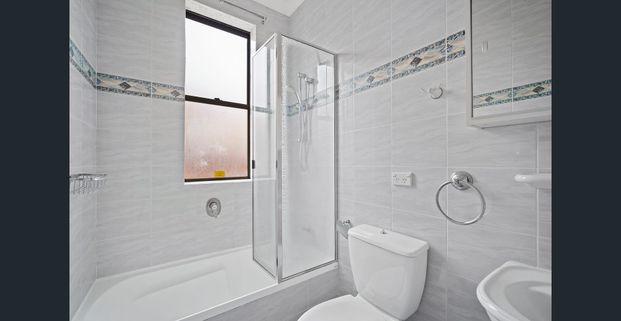 Spacious Family Home Right in the Heart of Burwood! - Photo 1