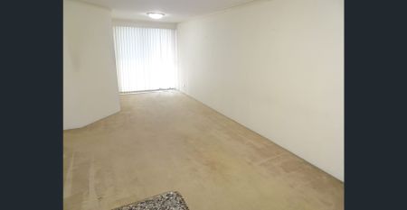 "CONVENIENT MODERN SECURED UNIT with new carpet - Photo 4