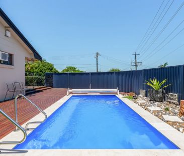 Beautifully Refreshed Family Home with Pool, Deck & Modern Comfort - Photo 2
