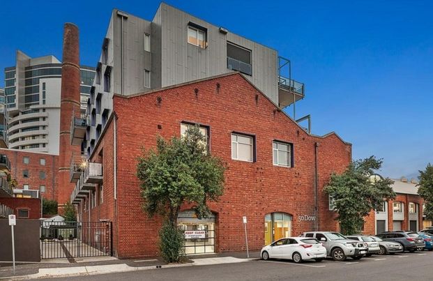 Stunning Split-Level Warehouse Conversion with Bay Views & Luxe Space - Photo 1