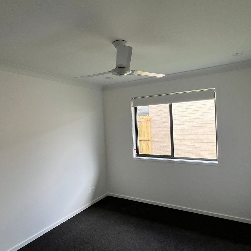 Brand New Four Bedroom Home! - Photo 1