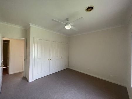 Elegant 2-Bedroom Unit Close to Town - Photo 2