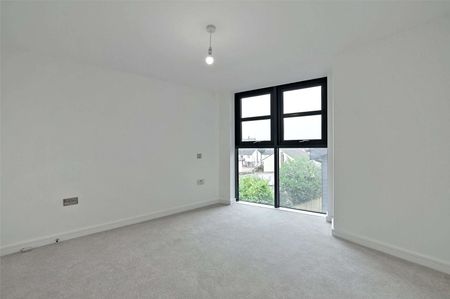 Modern newly built two bed apartment offering light, modern interiors in a sought after location. - Photo 2
