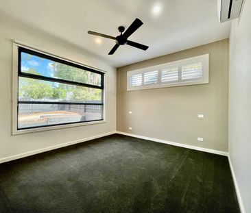 Architecturally Designed Large Three Bedroom Home in Premier Location! - Photo 1