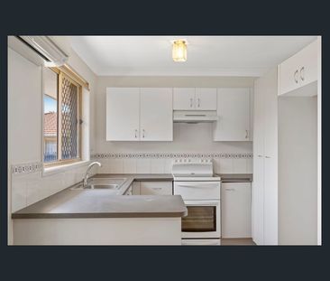 Updated Family Gem with Extra Living Space and Easy-Care Style - Photo 6