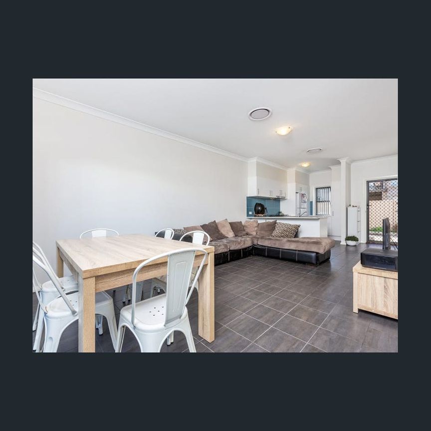 CONVENIENTLY LOCATED MODERN TOWNHOUSE - Photo 1