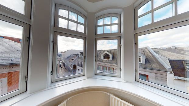 Centralt beliggende lejlighed med lys og livlig stemning - Foto 1