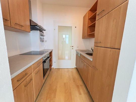 Stadtwohnung mit Balkon in den begrünten Innenhof! - Foto 1