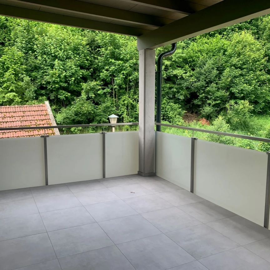 Erstbezug: Traumhafte Maisonette mit großzügigem, überdachtem Balkon - Photo 1