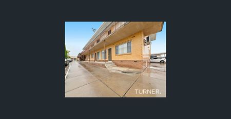 Quiet, rear ground floor unit - own carport and yard - Photo 3