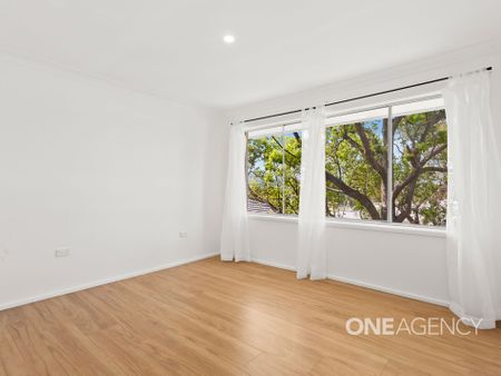 FAMILY HOME WITH 4 BEDROOMS AND BONUS 5TH BEDROOM POTENTIAL - Photo 4