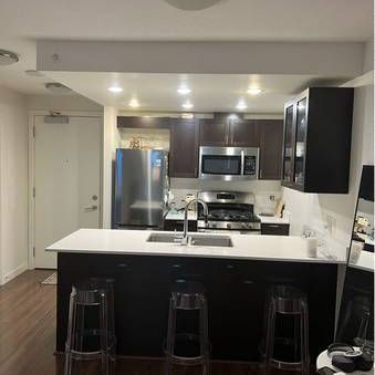 Large 1 BR + Den Flex condo @2300 Kingsway high rise condo - Photo 4