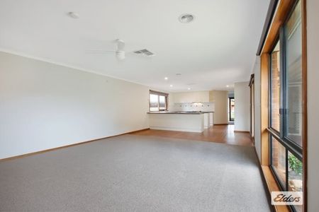 Charming 3-Bedroom Home with Outdoor Extras & Workshop! - Photo 5