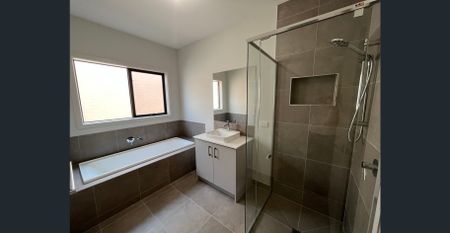 Near New with 3 Stunning Bathrooms. - Photo 2