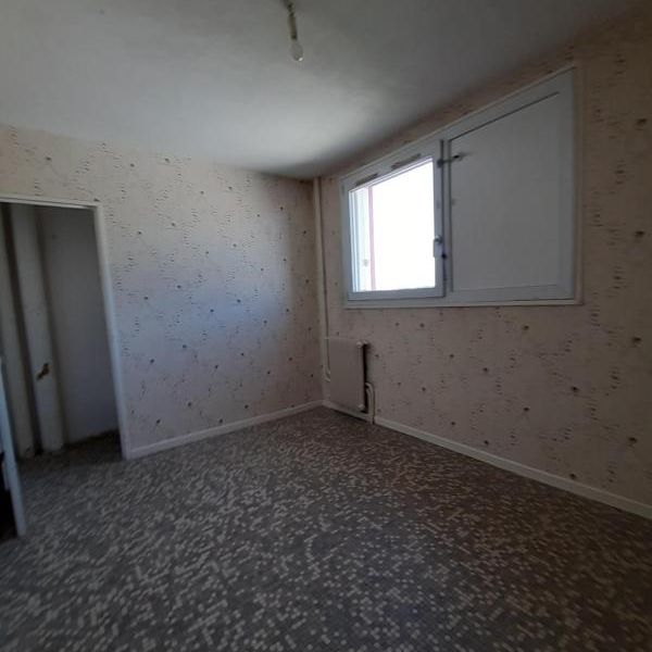 T3-3 RUE DU 140E R.I.A. 38100 GRENOBLE - Photo 1