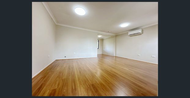 Uniting stylish 3 bedrooms with wardrobes, floorboards, air-conditioning, and a single carport. - Photo 1