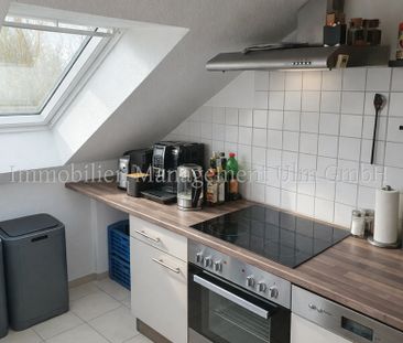Schöne 2-Zimmer-DG-Wohnung mit Balkon und Tiefgaragenstellplatz! - Foto 5