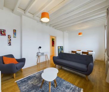 Au pied du centre ville, proche de la gare - Photo 1