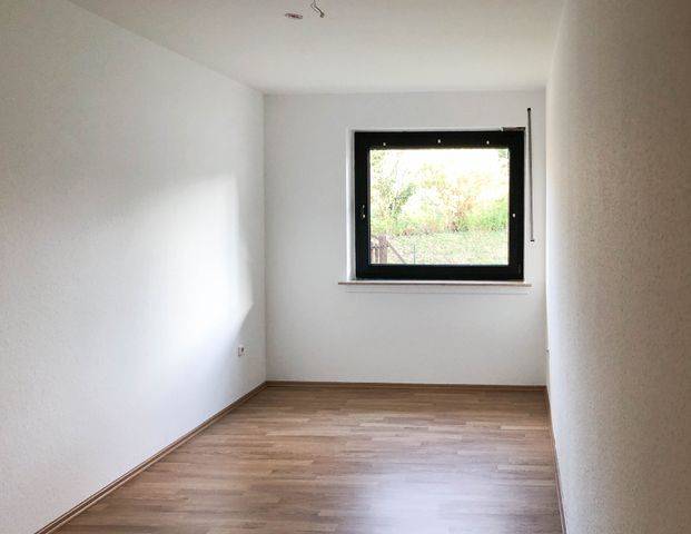 Gut geschnittene EG Wohnung mit Balkon und Garage - Photo 1