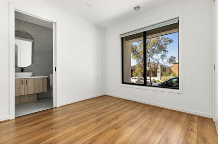 Modern Comfort Meets Effortless Living in a Stylish, Low-Maintenance Home - Photo 5