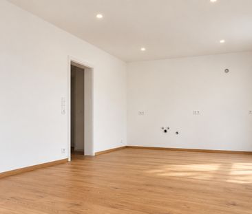 Geförderte kompakt geschnittene 3-Zimmer Wohnung mit Garten - 4/5 - Photo 3
