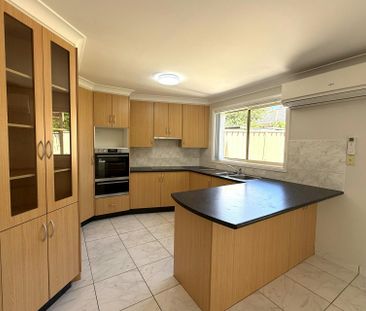 CONTEMPORARY DUPLEX IN HIGHLY DESIRED LOCATION - Photo 1