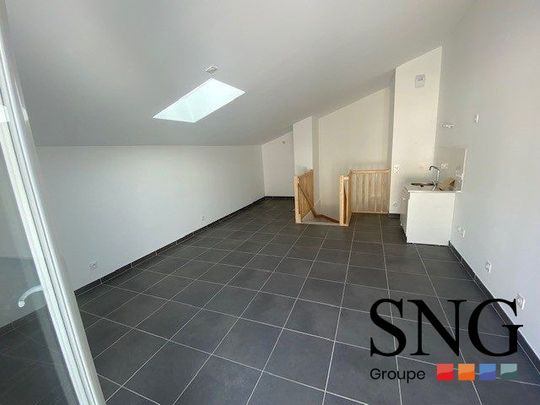 T3 AVEC DEUX TERRASSES ET UN GARAGE - Photo 1