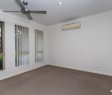 Spacious 4-Bedroom Home with Low-Maintenance Yard - Photo 4