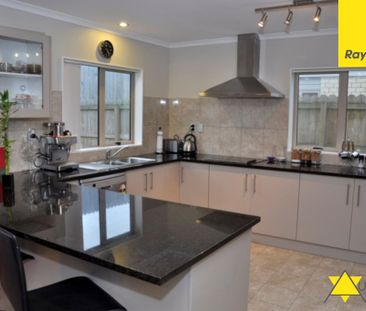 This immaculate four bedroom home is both private and welcoming and... - Photo 3