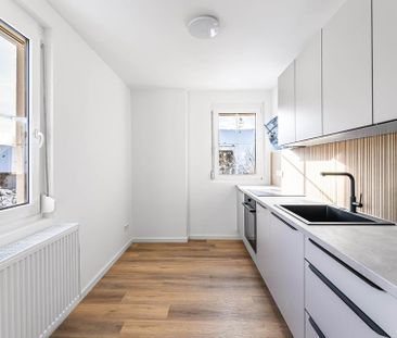 Frisch sanierte 2-Zimmer-Wohnung im Erstbezug mit Terrasse & Stellp... - Photo 2