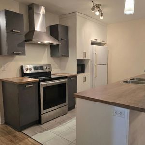 5½ Au Dernier étage - Photo 2