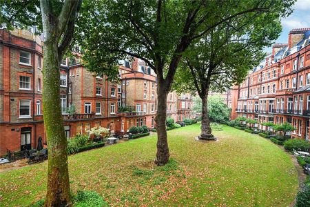 A bright and impressive two bedroom two bathroom apartment boasting a full length private balcony overlooking the manicured communal gardens. - Photo 3