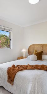 Top Floor Coastal Living with Light, Privacy and Lifestyle Convenience - Photo 4
