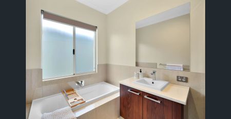 Stylish Family Home with Theatre, Study & Spacious Living in Piara Waters - Photo 3