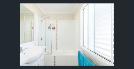 CONVENIENTLY LOCATED - WALK TO THE SHOPS - Photo 5