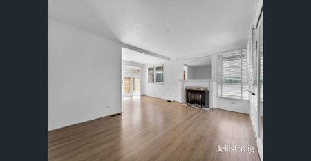 Generous Family Home with Multiple Living Areas & Entertainer’s Backyard - Photo 4