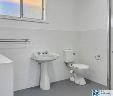 Charming Home with Flexible Living Space and Spacious Backyard - Photo 3