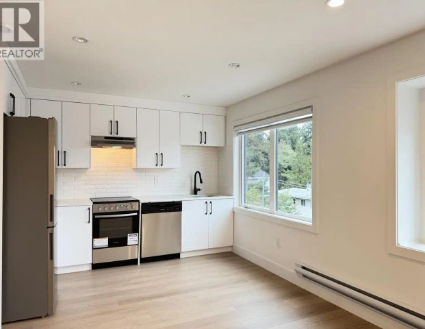 LANEWAY 1150 CHARLAND AVENUE — 1 Bedroom - Photo 1