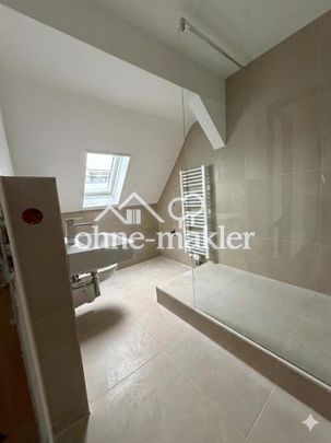 Wohnen auf zwei Ebenen: Sanierte 3-Zimmer Wohnung mit zusätzlichem Nutzraum - Foto 1